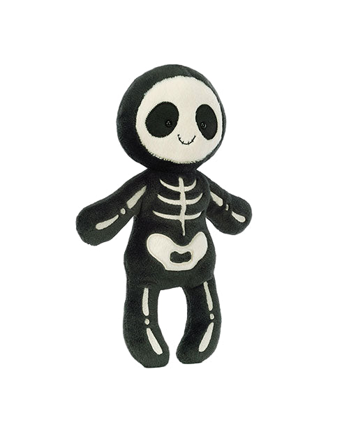 Plush toy resembling a skeleton with a black body and white skeletal features, including large eye sockets, ribs, and bones on the limbs. The face is white with black eyes and a small smile.
