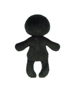 Black plush toy viewed from the back, featuring a large round head, two arms, and two legs, with no visible facial features or clothing.