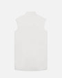 The backside of a sleeveless white shirt with a collar. 