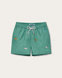 A pair of green children’s shorts with an elastic waistband and a white drawstring. The shorts feature embroidered multicolored sea flowers in various poses scattered across the fabric.