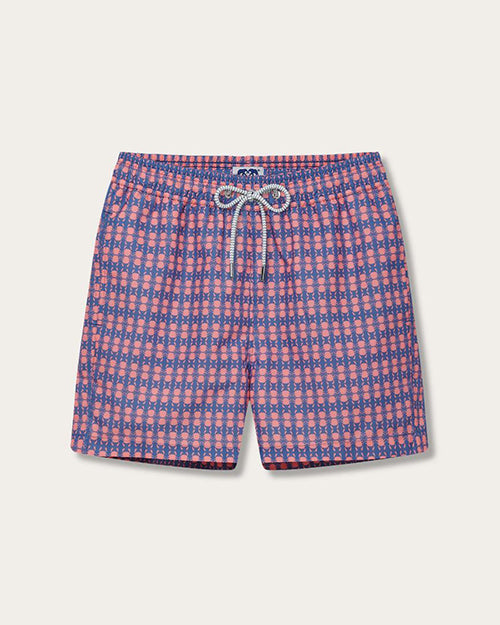 A pair of shorts with a repeating geometric pattern in shades of blue, pink, and white. The shorts feature a  elastic waistband with a white and grey drawstring. 