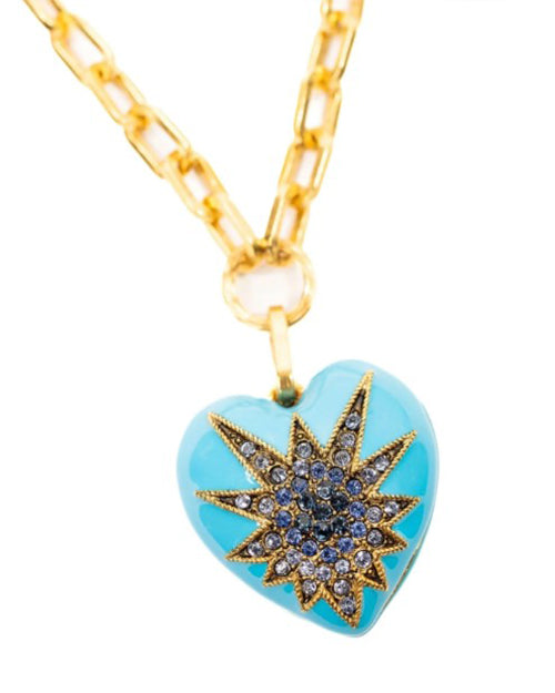 Necklace with a blue heart pendant featuring a star design on a white background