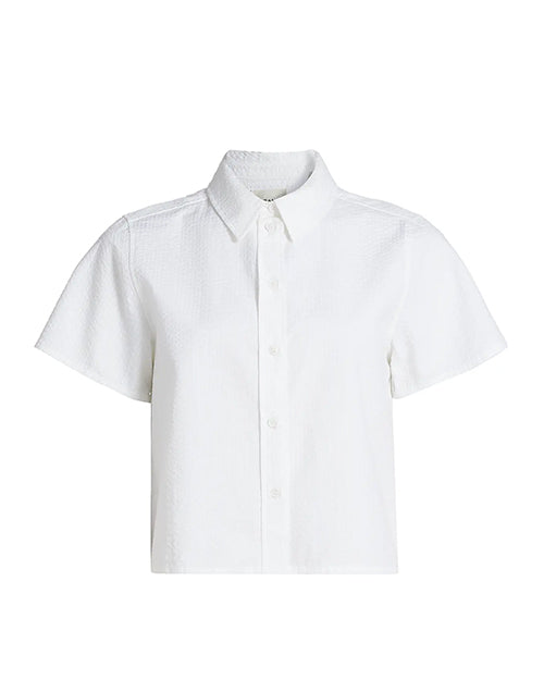 A white, short-sleeved, button-up shirt with a collar. The shirt has a simple and clean design with no visible patterns or logos. No person appears in the image.