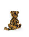 A back view of a plush toy tiger with prominent black stripes on an orange and white body. The toy has a matching small ears and tail.