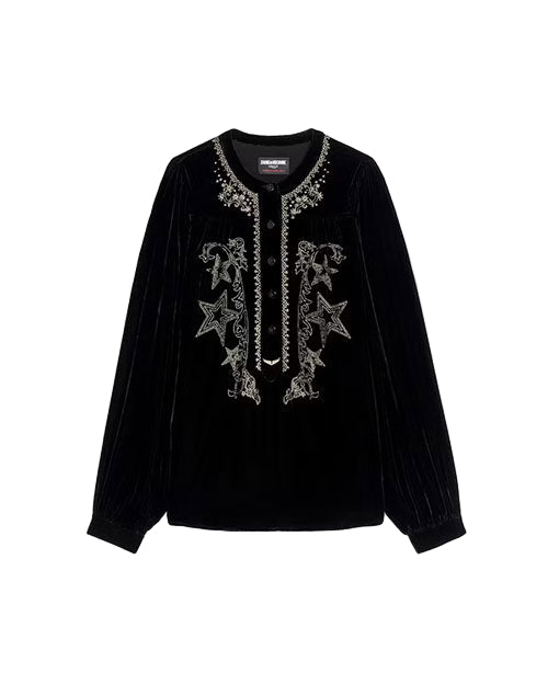 Black long-sleeve blouse with a round neckline and intricate embroidery featuring stars and floral patterns, including a button placket and slightly puffed sleeves.