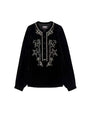 Black long-sleeve blouse with a round neckline and intricate embroidery featuring stars and floral patterns, including a button placket and slightly puffed sleeves.