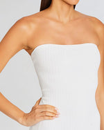 Close up of a strapless white dress. Only front torso shown in this picture.