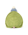 Plush turtle toy with a green shell featuring stitched hexagonal patterns, a small tail, and a blue hat with a white pom-pom on top.