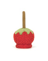 Back view of a Plush toy designed to look like a candy apple, featuring a red textured body, green caramel-like detailing at the top, and a brown stick protruding from the top, resembling a traditional candy apple.