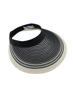 Black and white striped visor with a a tag reading "Eugenia Kim" on a white background