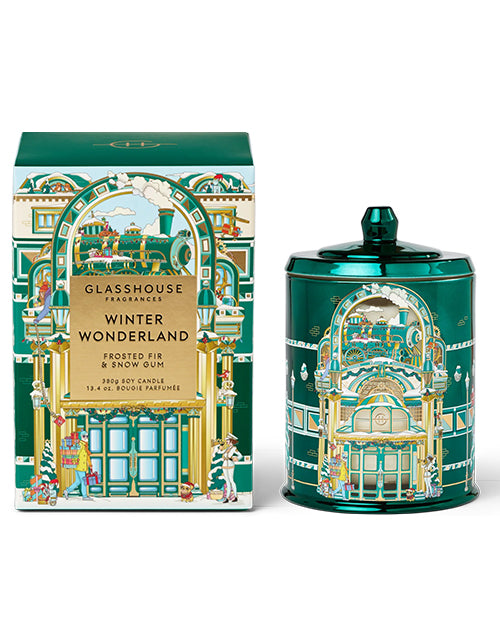 Glasshouse Fragrances Winter Wonderland candle packaging in green and gold tones on a white background