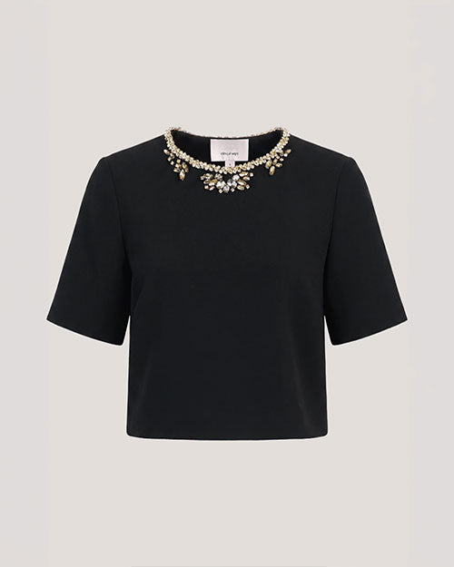 A black short-sleeved top with an embellished jeweled neckline.