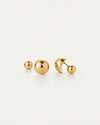 Pair of gold stud earrings featuring a spherical design with a polished finish, displayed on a light background.