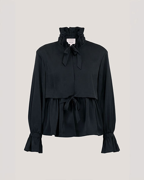 A black ruffle-neck peplum top with a tie-front detail and voluminous sleeves