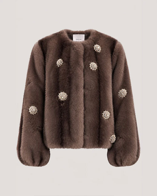 Brown fur-textured jacket with a collarless neckline, voluminous sleeves, and pearl-like floral embellishments throughout.