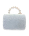 Back view of a small light blue faux fur handbag with a pearl handle and a simple rectangular shape.