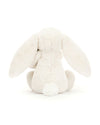Back view of a white plush bunny toy with long floppy ears and a small round tail, featuring a soft and fluffy texture.