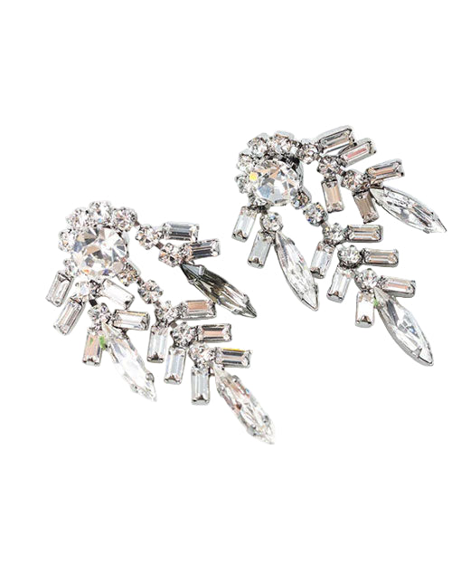 Pair of silver-toned statement earrings featuring a cluster of clear crystals in various cuts, including round, baguette, and marquise shapes, arranged in a fan-like design with a central large round stone.