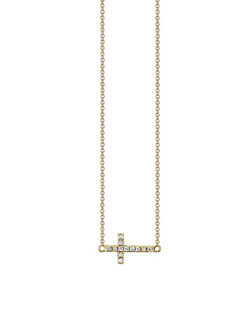 Gold necklace featuring a horizontal cross pendant adorned with small clear gemstones. The cross is attached to a delicate gold chain.