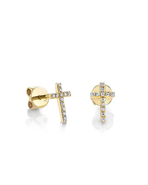 Pair of gold stud earrings shaped like crosses, each encrusted with small clear gemstones. The earrings have polished gold backs and posts.