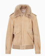 Beige suede bomber jacket with a plush faux-fur collar, flap pockets, ribbed hem, and snap-button front closure.