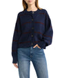 Model wearing a navy blue button-front cardigan with subtle horizontal stripe details and light-wash jeans.