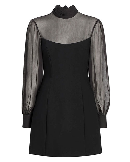  A black mini dress featuring a fitted silhouette with a sweetheart-style bodice and sheer long sleeves. The dress has a high sheer neckline with a gathered detail and matching sheer yoke, creating a layered effect. The sleeves are slightly puffed with fitted cuffs, and the main body of the dress is made from an opaque fabric.