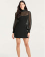 A black mini dress featuring a high neckline and sheer long sleeves with buttoned cuffs. The upper chest and shoulders are made of sheer fabric, creating a contrast with the opaque fitted bodice and A-line skirt. The dress has a sleek, elegant design with a slightly flared hem.