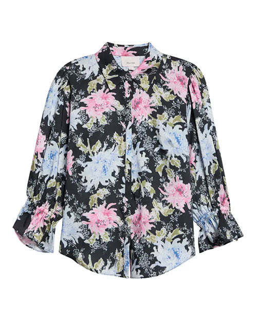 Black button-front blouse with a painterly floral print in pink, white, and green, featuring a pointed collar and three-quarter sleeves with ruffled cuffs.