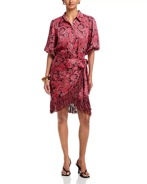 Red paisley print wrap dress with short sleeves, button-front detail, side tie waist, and fringed hem