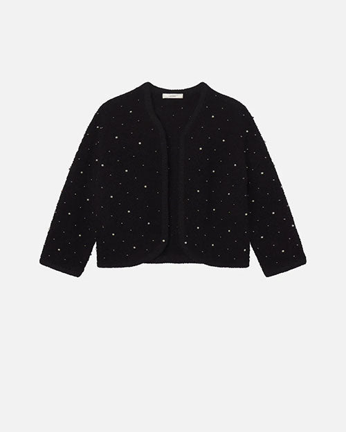 Black cropped jacket with long sleeves and an open front design. The jacket features a textured knit fabric embellished with small pearl-like beads arranged in a scattered pattern.