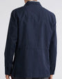 Back view of a person wearing a navy jacket.