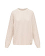 Cream-colored cable-knit sweater with long sleeves, a ribbed crew neckline, and a relaxed fit. The sweater features a textured cable pattern throughout and a small decorative emblem near the hem.