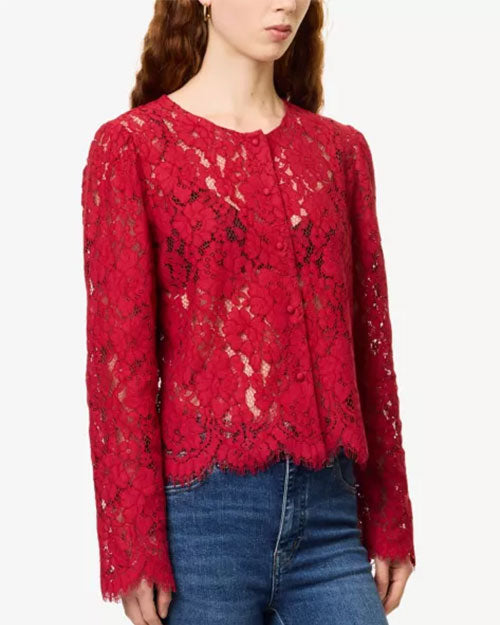 Red floral lace cardigan-style top with a round neckline, button-front closure, and scalloped hem, paired with blue jeans against a light gray background.