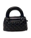 Back view of a small black quilted handbag with rounded handles and a plain design without embellishments.