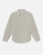 Product image of a long-sleeve button-down shirt displayed flat against a light background, featuring fine vertical stripes in soft neutral tones. The shirt has a pointed collar, full button front, single chest pocket, and a gently curved hem, with a clean, tailored silhouette.