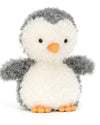 Plush penguin toy with a fluffy gray and white body, orange beak, and orange feet. The penguin has small black eyes and outstretched wings, giving it a soft and cuddly appearance.