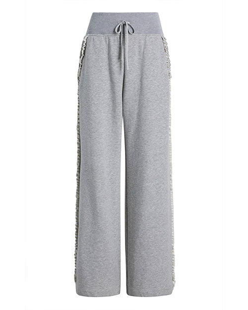 Front view of gray wide-leg pants featuring a high ribbed waistband with a drawstring tie and ruffled trim running down the outer sides of both legs.