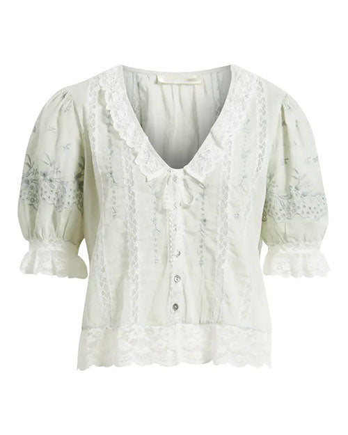 Green lace blouse with puff sleeves, scalloped V-neck collar, button front, delicate embroidery, and lace-trimmed hem.