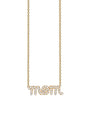 Gold necklace with a pendant spelling “mom,” encrusted with small sparkling diamonds, hanging from a delicate chain.