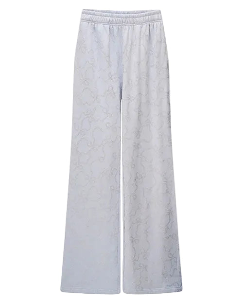 Light gray wide-leg pants with an elastic waistband and a subtle tonal floral pattern, displayed against a white background.