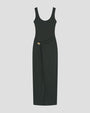 Dark green sleeveless midi dress with a scoop neckline and draped side detail secured by a small gold accent.