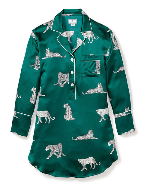 Green satin nightshirt with long sleeves, a collar, button-down front, and a left chest pocket, featuring a white leopard print pattern with leopards in various poses including sitting, walking, and lying down.