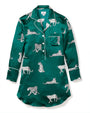 Green satin nightshirt with long sleeves, a collar, button-down front, and a left chest pocket, featuring a white leopard print pattern with leopards in various poses including sitting, walking, and lying down.