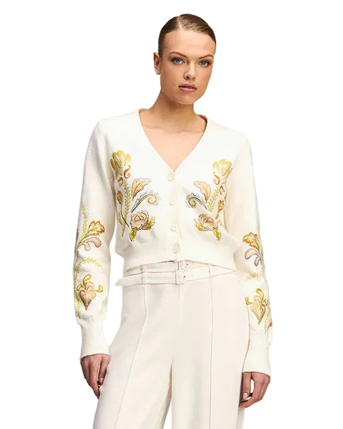 Cream V-neck cardigan with button front and delicate yellow and beige floral embroidery on the front and sleeves.