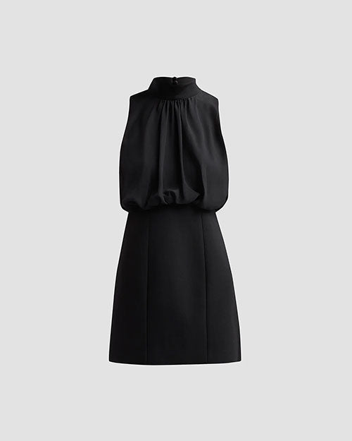Black sleeveless mini dress with a gathered high neckline and fitted skirt