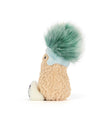 Plush toy resembling a small furry creature with a textured beige body, fluffy green tuft on top of its head, light blue band around the tuft, small black eyes, and a partially visible white foot.