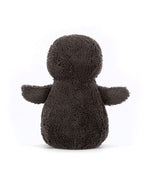  Back view of a dark gray plush toy with a rounded head, plump body, and two short arms extended outward. The toy has a soft, fuzzy texture.