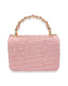 Back view of a small rectangular pink tweed handbag embellished with sequins, featuring a braided top handle with gold-tone chain links.