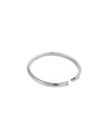 A sleek, minimalist silver bracelet with a slightly open design and smooth polished finish, displayed on a light neutral background.